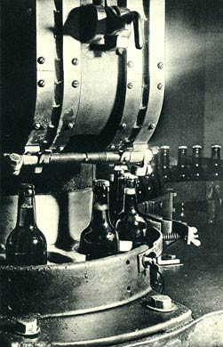 Capping Bottles At The Brewery