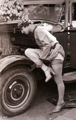 Lady Mends A Car