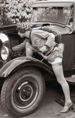 Lady Mends A Car