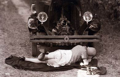 Lady Mends A Car