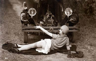 Lady Mends A Car