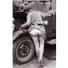 Lady Mends A Car
