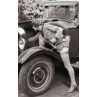 Lady Mends A Car