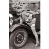 Lady Mends A Car
