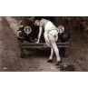 Lady Mends A Car